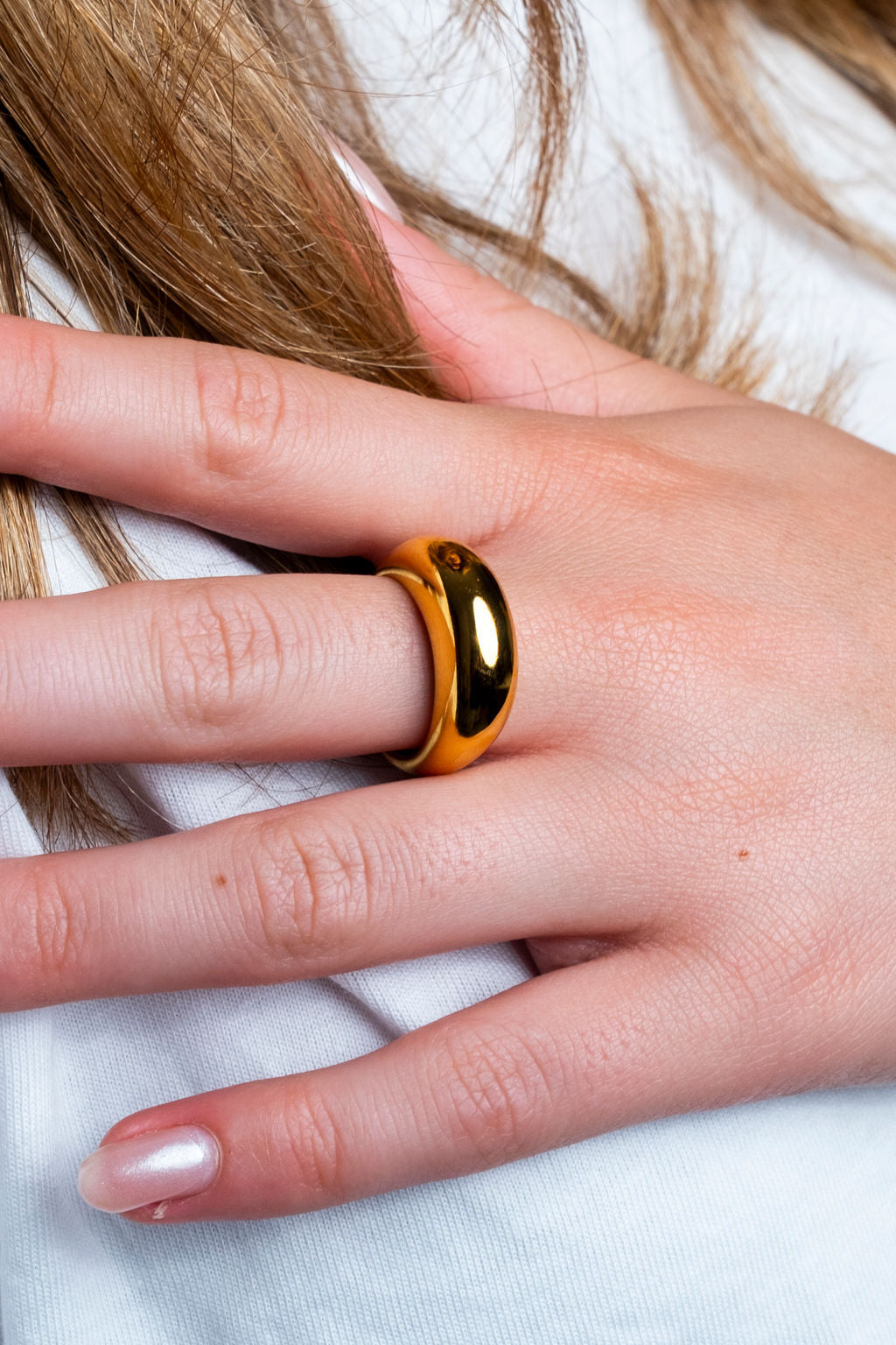 Gold chunky arc ring, waterproof and hypoallergenic, suitable for everyday wear worn by model