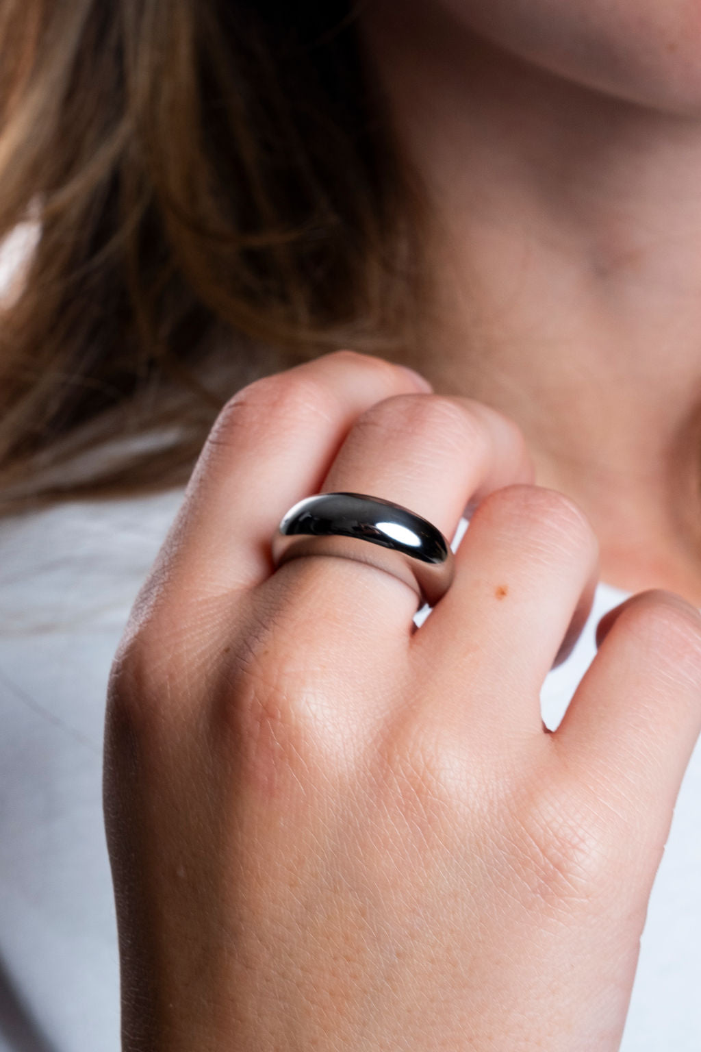 Silver chunky arc ring, waterproof and hypoallergenic, perfect for everyday wear, on model